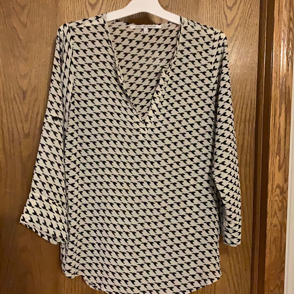 Size Large, cream with black birds